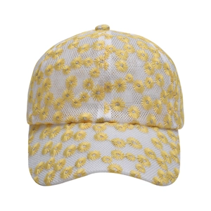 Detail of breathable white mesh baseball cap with yellow daisy embroidery patterns