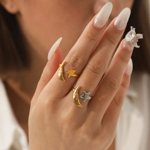 18K gold plated stainless steel open ring featuring a celestial moon and star face design
