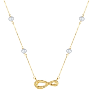 Detailed close-up of golden necklace with baroque pearls and infinity symbol pendant