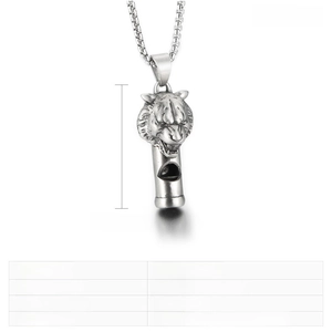 Detail view of lion head whistle pendant with dimensions 43x23mm in stainless steel