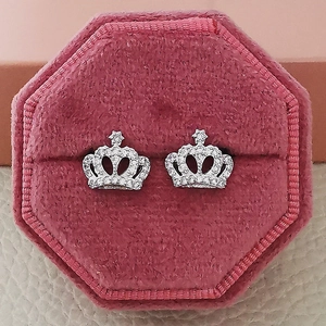 Luxury silver crown stud earrings with white cubic zirconia in a velvet gift box