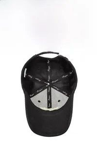 Detail view of the breathable mesh lining and reinforced inner structure of the black baseball cap