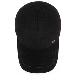 Classic black winter baseball cap with ear flaps and silver side logo on white background
