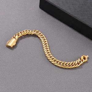 Detailed view of heavy gold-plated stainless steel Cuban link bracelet with square clasp