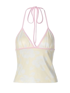 Floral print halter neck top in beige with white flower patterns and pink straps