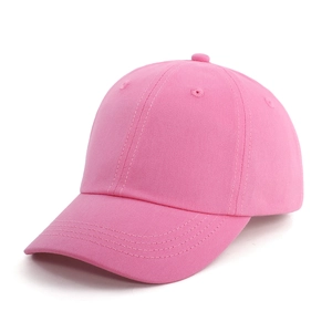 Close-up of pink cotton baseball cap featuring twill texture and breathable eyelets