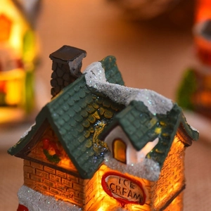 Lighted Christmas village ice cream shop with snow roof for festive tabletop decoration
