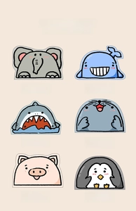 Close-up of cute cartoon animal patterns including whale, shark and pig designs