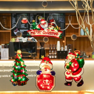 Sucker-style LED Christmas window lights with Santa and tree motifs for festive decor