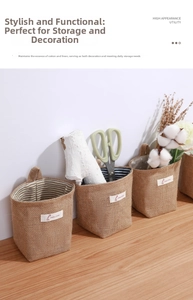 Close-up detail of small linen hanging storage bag with stripe lining for tidy room decor.