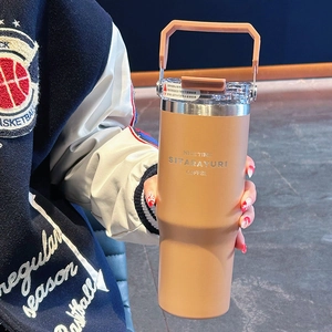 Matte khaki stainless steel insulated coffee mug with handle and transparent lid