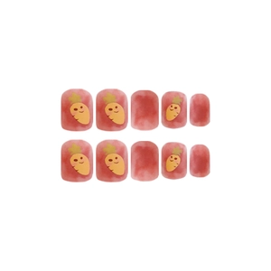 Orange gradient press-on nails with cute hand-painted carrot smile face designs