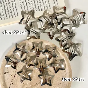Y2K silver star hair clips in 3cm and 4cm sizes displayed on a minimalist background