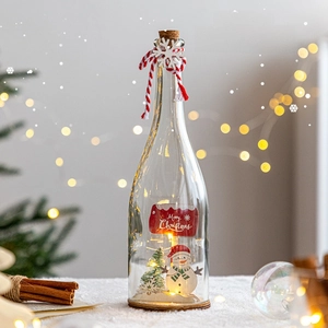 Lighted Christmas glass jar with snowman and LED lights for festive holiday desk decor