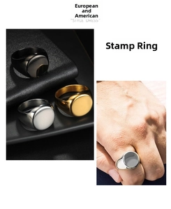 Macro detail of round signet rings in silver gold and black finishes on leather