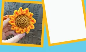 Close-up detail of a handmade crochet sunflower keychain with intricate wool texture