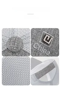 Detail view of breathable grey mesh baseball cap with China embroidery and metal logo