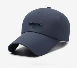 Detail of dark blue quick-dry baseball cap showing breathable laser-cut side vents