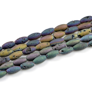 Macro shot of rainbow druzy agate beads with natural metallic texture for DIY jewelry