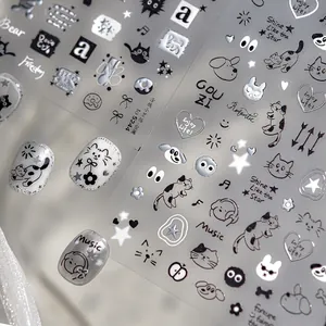 Graffiti style nail art stickers featuring silver chrome cats, stars and music notes