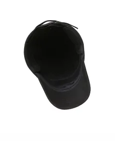 Detail view of the black cotton flat top hat showing interior lining and sweatband