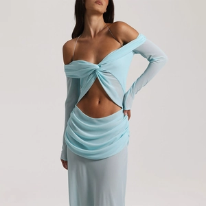 Detail view of light blue off-shoulder chiffon dress with cutout waist and pleated textures