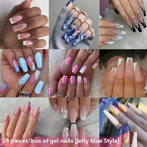 Detail showing 24pcs box set of long press-on nails with various marble and glitter designs