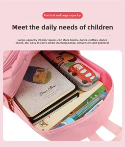 Spacious interior of pink ballet backpack showing large capacity and multi-layer storage