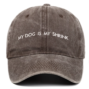 Close-up of MY DOG IS MY SHRINK embroidery on vintage washed cotton baseball cap