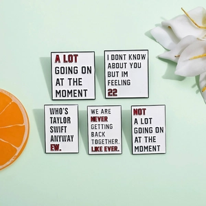 Set of 5 enamel pins with fun English quotes on white square badges for clothing