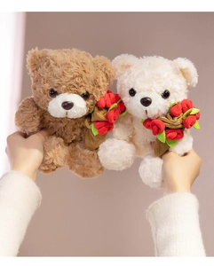 Close-up of soft plush teddy bears holding red fabric roses with detailed fur texture