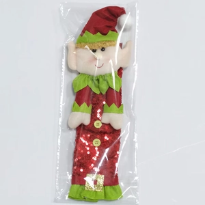 Close-up of Christmas elf handle decorations in original transparent plastic packaging