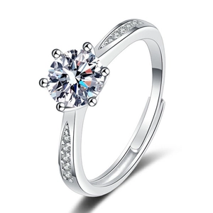 Macro shot of six-prong solitaire ring with brilliant round stone and adjustable band