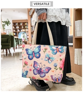 Detailed view of the colorful butterfly floral print on a large canvas tote shopping bag