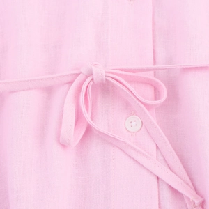 Pink linen long sleeve shirt featuring waist tie-up bow and white button detail