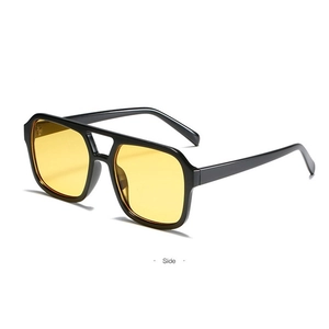 Side view of retro square aviator sunglasses with black frame and yellow lenses