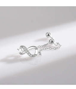 Detail of adjustable silver ring with infinity symbol and pave micro-inlaid zircon
