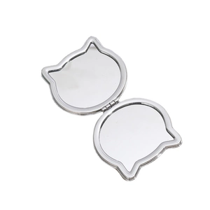 Cat head shaped silver metal folding double-sided makeup mirror with a polished finish