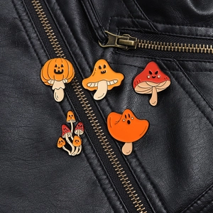 Halloween Spooky Mushroom Enamel Pins Set with pumpkin and ghost motifs on leather jacket