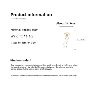 Detailed size and weight specs for the golden long chain tassel earring accessory
