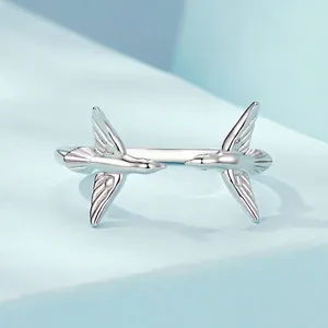 Elegant 925 sterling silver open ring featuring two flying birds with a polished finish