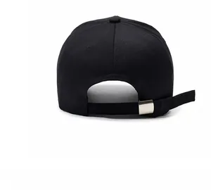 Rear view of black cotton baseball cap showing adjustable silver metal buckle strap