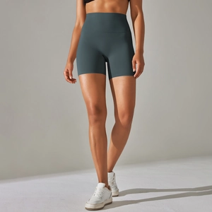 Detailed close-up of high-waist slate blue yoga biker shorts with seamless texture