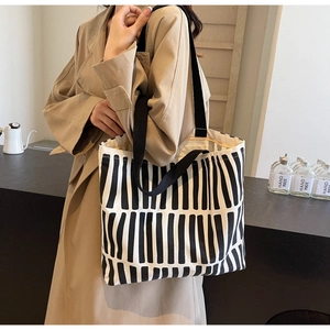 Large capacity black and white striped canvas tote bag for shoulder and hand carry