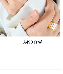 Close-up of a wide gold ring with white striped details on a model hand, model A490