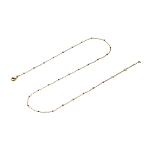 Elegant gold beaded snake chain necklace with lobster clasp shown on white background