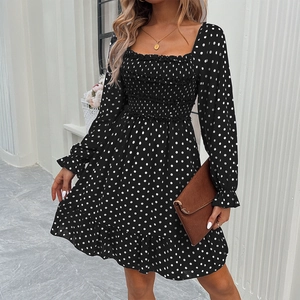 Elegant black polka dot long sleeve dress with square neck and ruffled hem detail