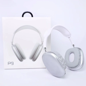 Macro view of silver wireless P9 headphones next to the white retail packaging box