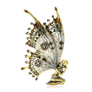 Exquisite gold alloy butterfly fairy brooch with colorful enamel wings on white background