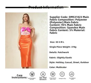 Detail of color-block satin dress showing fabric composition and orange-pink patchwork design